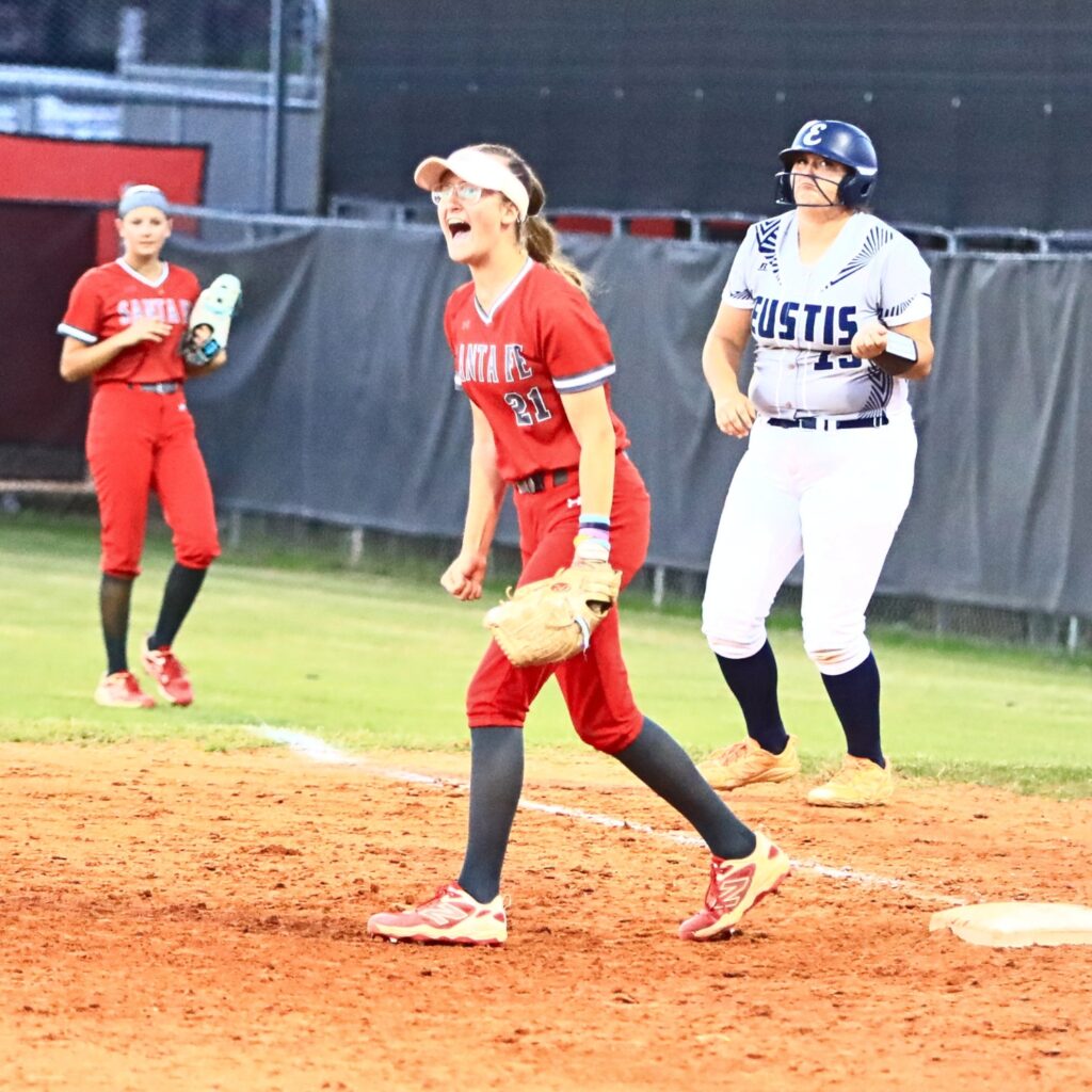 Santa Fe's Ryleigh Davis (21) gets the second out in the top of the sixth inning against Eustis in the 3A-Region 2 Final. Photo by C.J. Gish