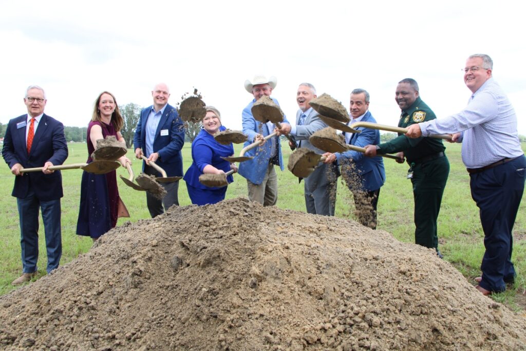 National, state and local officials broke ground on the first of two 325,000-square-foot hydroponic greenhouses in Newberry.