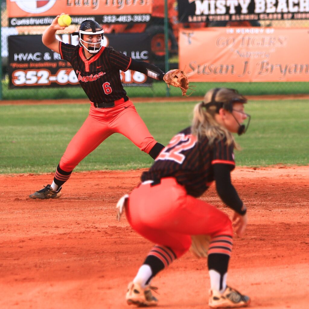 Trenton's Emaleigh Philmon (6) with a second inning assist for the first out against Williston in the Rural-Region 4 Final. Photo by C.J. Gish