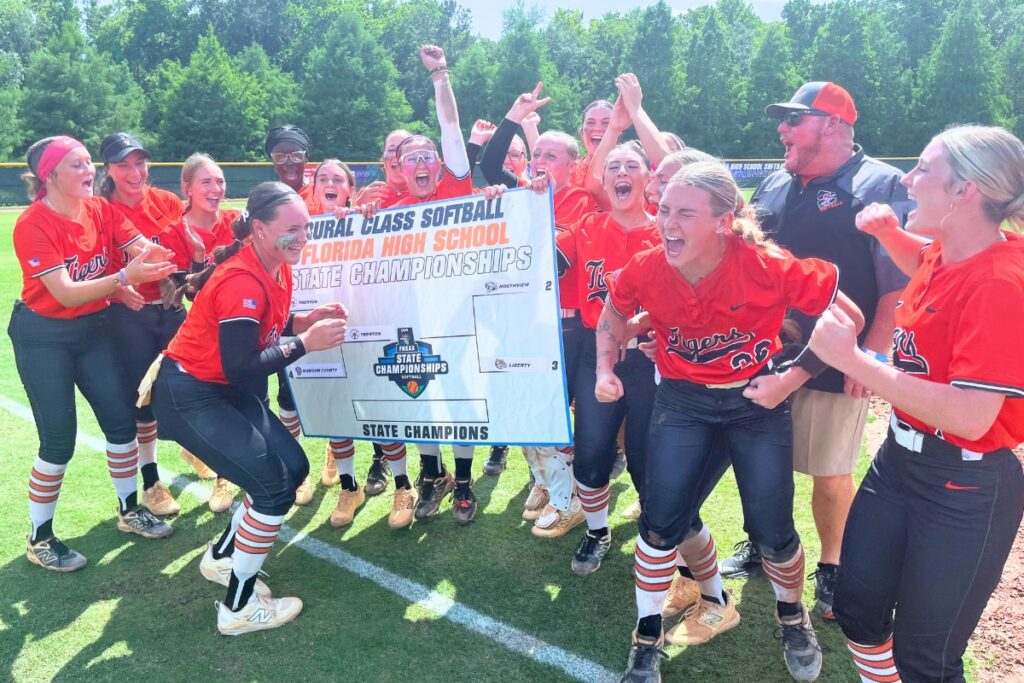 Two-time defending Rural state softball champion Trenton celebrates after advancing to its third straight title game with a 1-0 win over Madison County in the state semifinals on Tuesday. Photo by Mike Ridaught