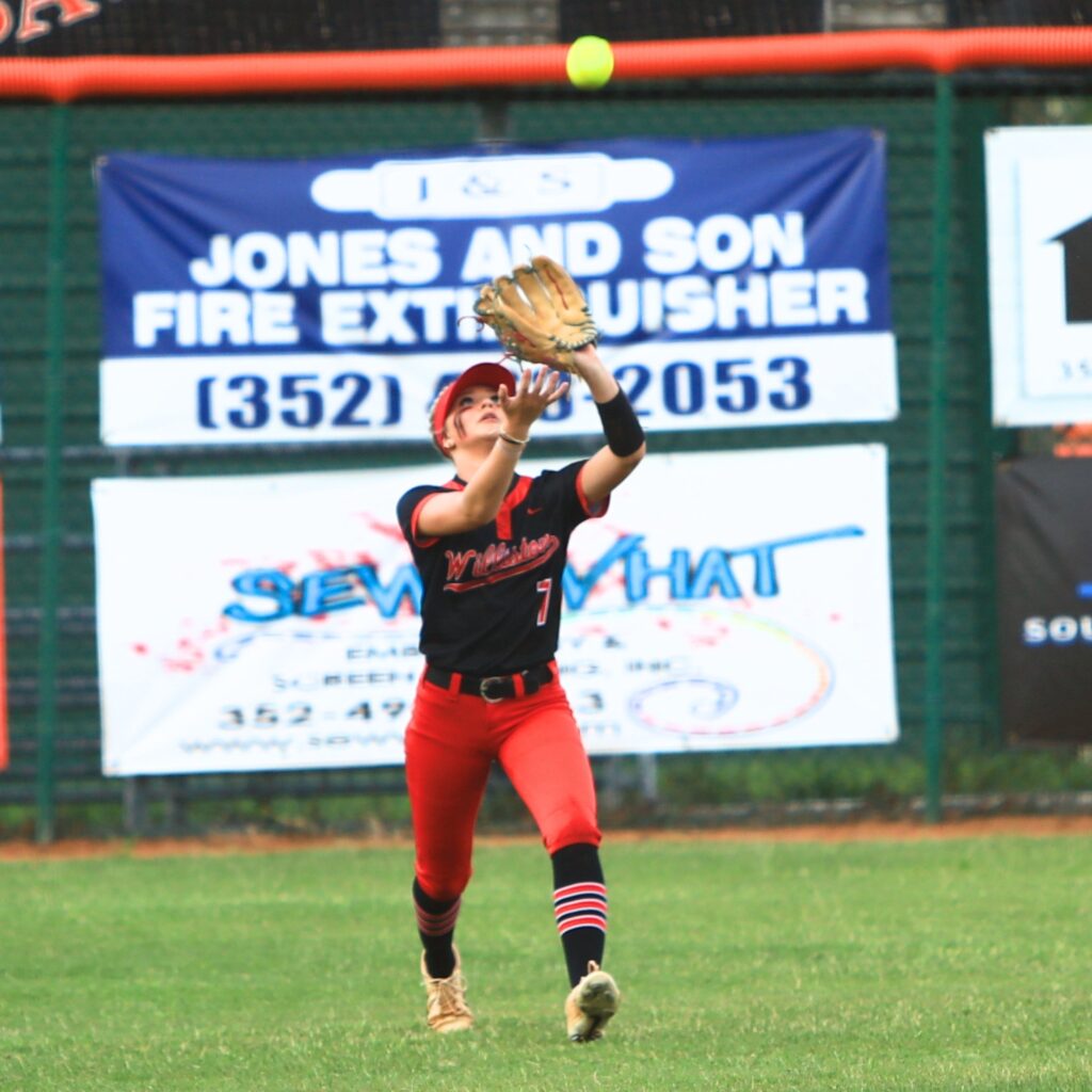 Williston's Layla Crago (7) catches the third out in the bottom of the first inning against Trenton in the Rural-Region 4 Final. Photo by C.J. Gish