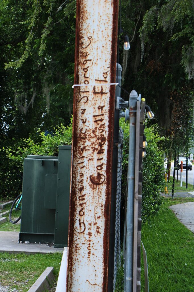 A refurbished beam from the former icehouse stands at the entrance of Cypress & Grove. Photo by Lillian Hamman