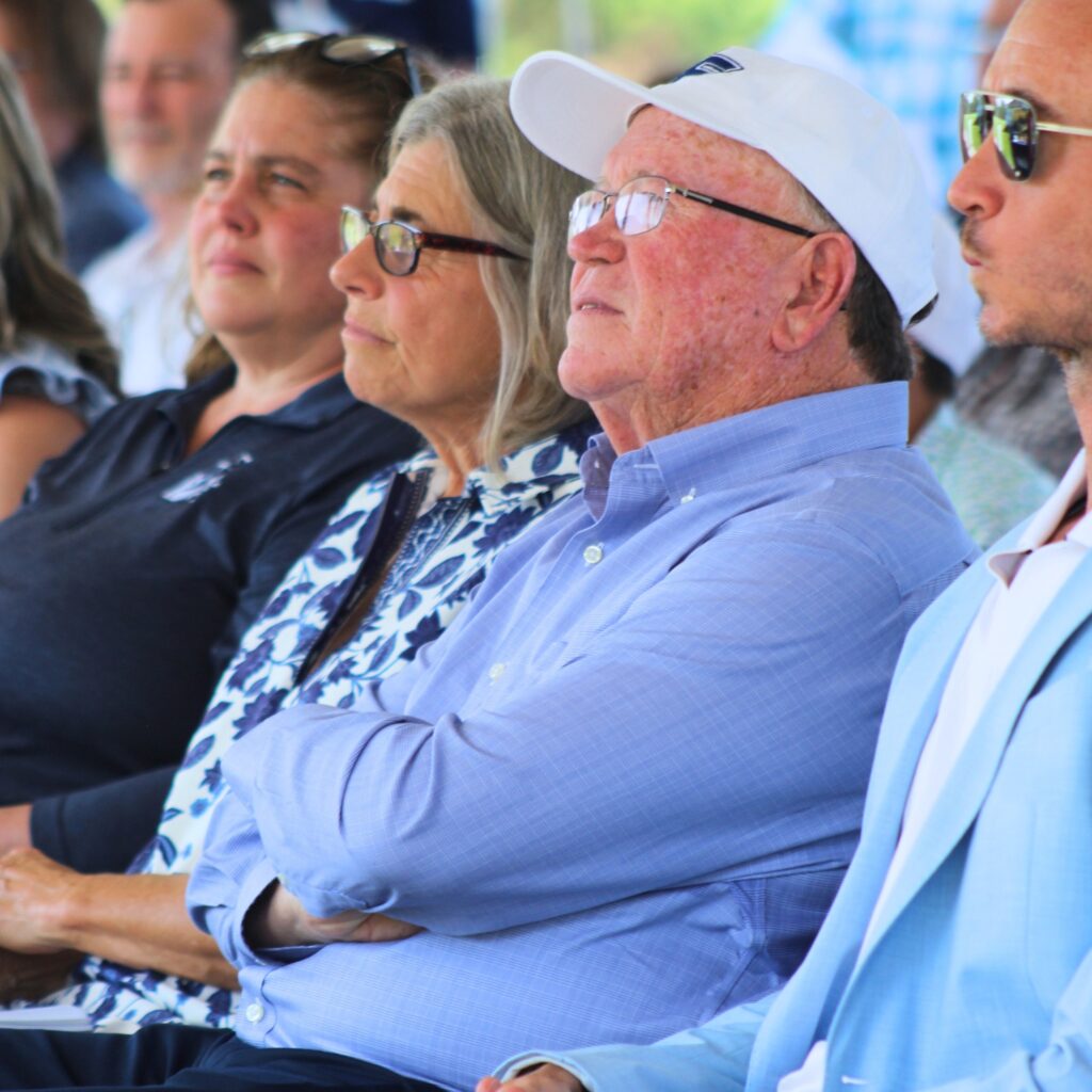Alan Hitchcock (in hat) watches the speakers. Photo by Lisa Brosky - Santa Fe College