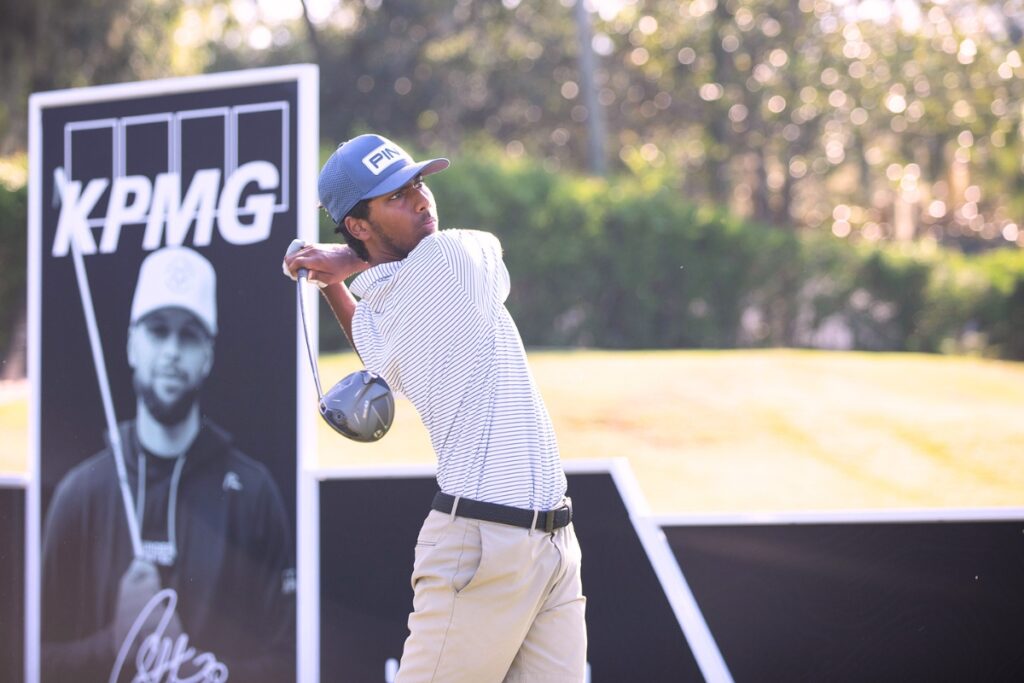 Atharva Rajeshkumar of Ponte Vedra Beach follows the trajectory of his ball on Tuesday during the Underrated Golf Tour at the Mark Bostick Golf Course in Gainesville. Photo by Megan V. Winslow