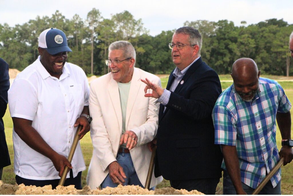 From left, Donald Long, Fletcher Hope, Tim Marden and Tony Mazon help break ground on the new wastewater treatment plant.