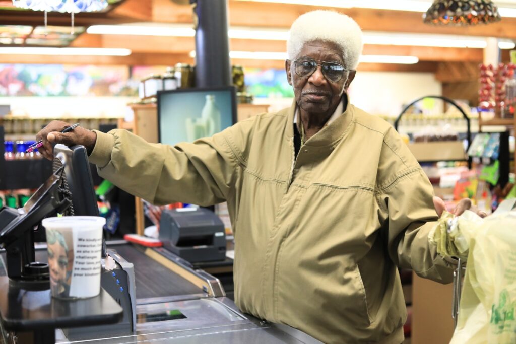 George Jones, 89, has worked at Ward's Supermarket with two of the grocer's four family generations. Photo by Lillian Hamman