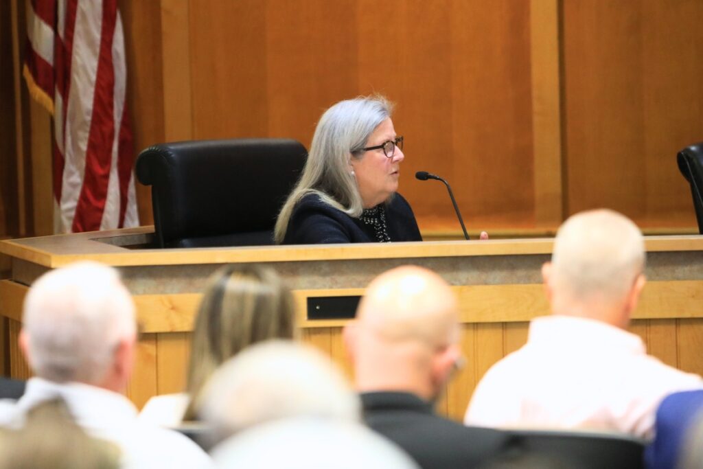 Land use attorney Patrice Boyes defended the city's unpublicized May 21 workshop. Photo by Lillian Hamman