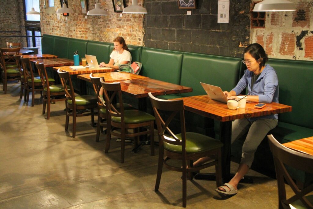 Morning Brew Wi-Fi creates a community workspace in the shop. Photo by Lillian Hamman