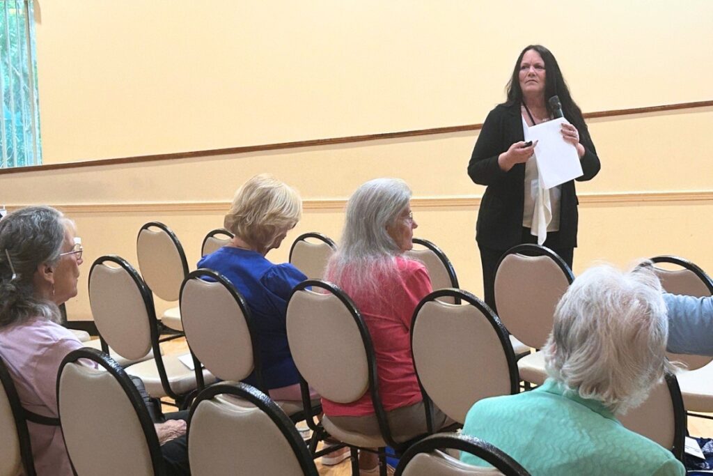 Senior vs. Crimes Project Region 4 Director Judy Harden talks to seniors at a June 16 discussion panel. Photo by Ronnie Lovler 1