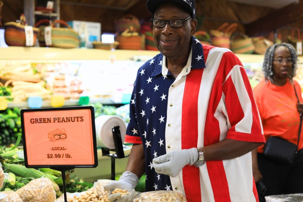 Ward's regular Allen Hickmon shops at Ward's for the perfect peanuts to boil. Photo by Lillian Hamman