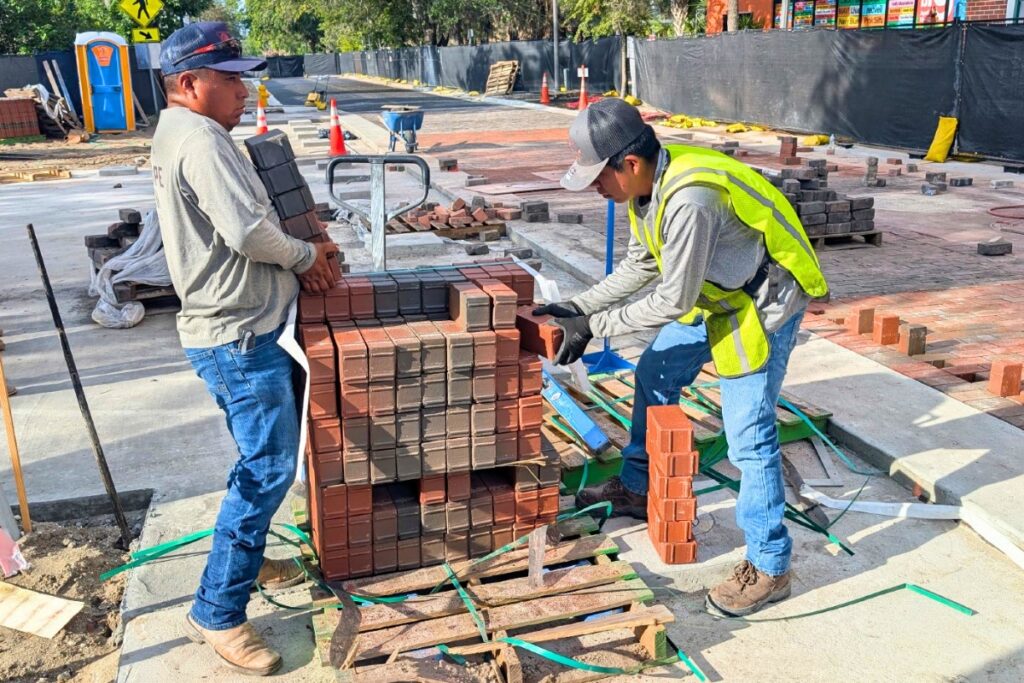 Workers with bricks at The Streatery in downtown Gainesville. Courtesy city of Gainesville