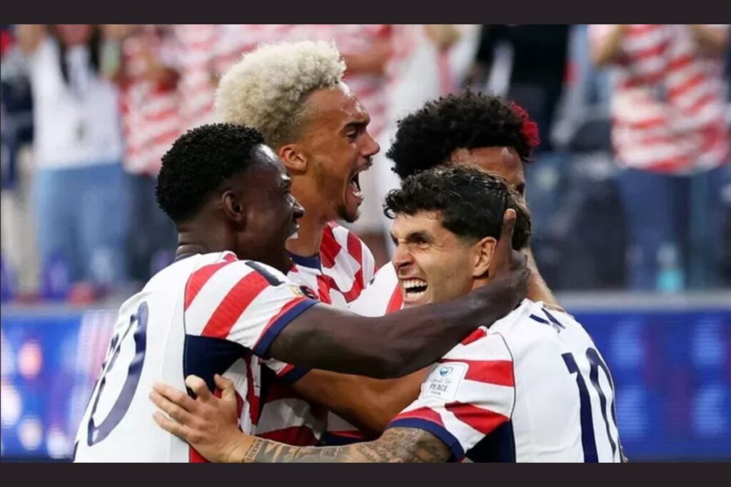 The US celebrates a goal during its 4-1 win over Paraguay in the opening round of the World Cup.