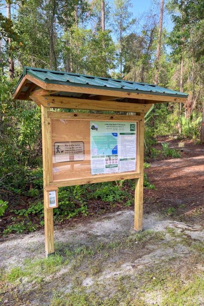 A kiosk at the parking lot shows the trail and bench along the back. Photo by Seth Johnson