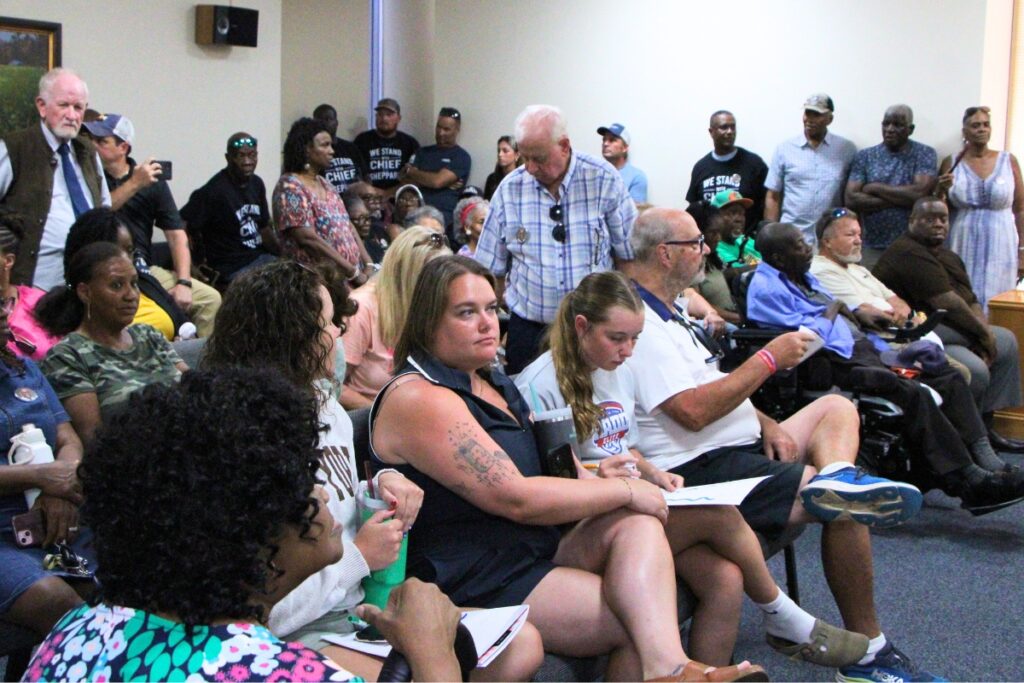 Community members packed High Springs City Hall to speak on behalf of Police Chief Antoine Sheppard before the City Commission rescheduled the meeting due to a broken elevator.