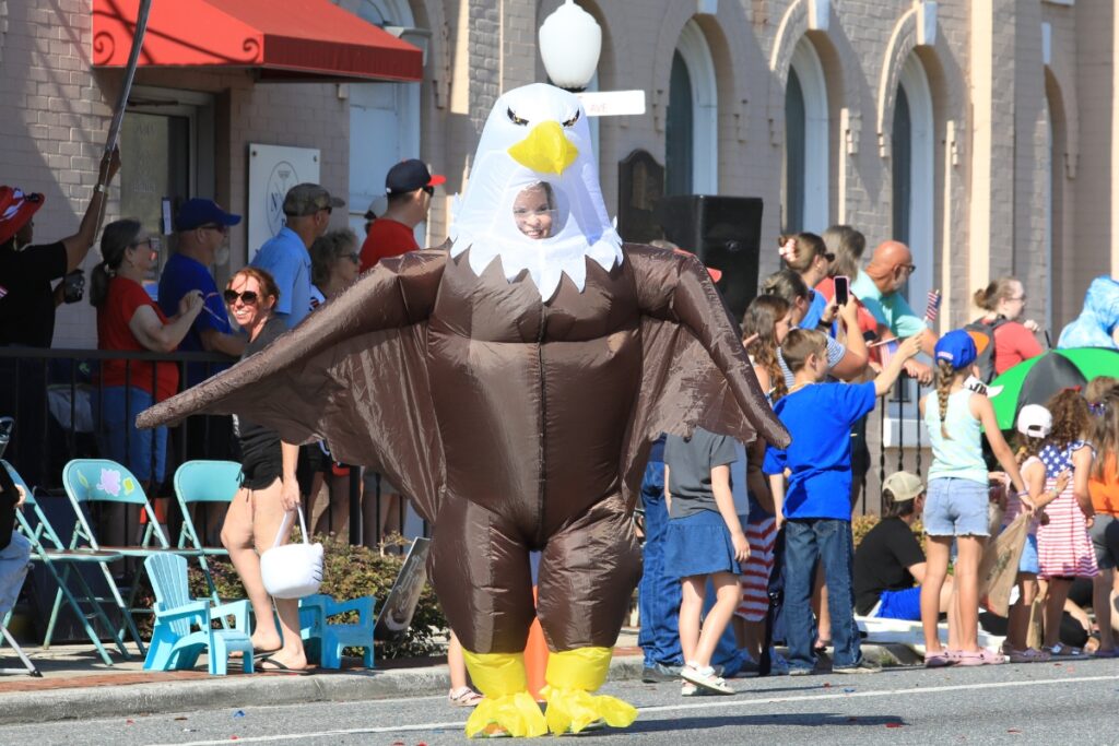 Jenn Garrett flapped through Newberry's Fourth of July Parade as a Bald Eagle. 