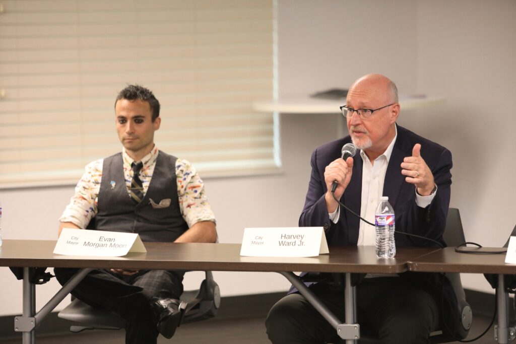 Mayor Harvey Ward (right) speaks during a candidate forum with challenger Evan Moon. Photo by Seth Johnson