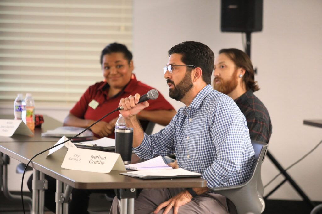 Nathan Crabbe speaks at a candidate forum. Photo by Seth Johnson