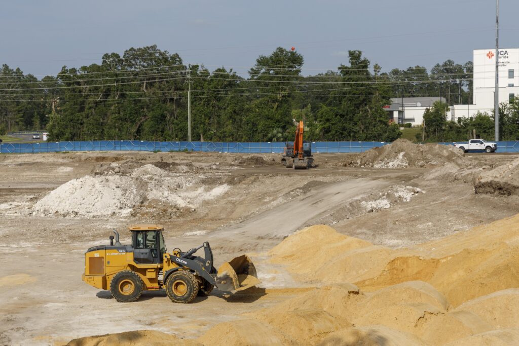 The former wooded property slated for Gainesville Fire Station #9 is reduced to sand and exposed earth along Archer Road in Gainesville, Fla., on Wednesday, July 29, 2026. The city says construction required the removal of 521 regulated trees and plans to plant 124 native trees when the project is complete.