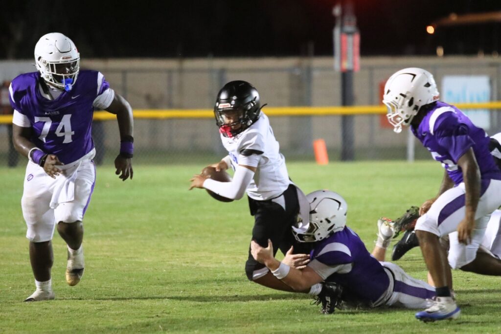 A Ridgeview (Orange Park) runners is stopped by the Gainesville defense on Thursday. Photo by Walker Smith