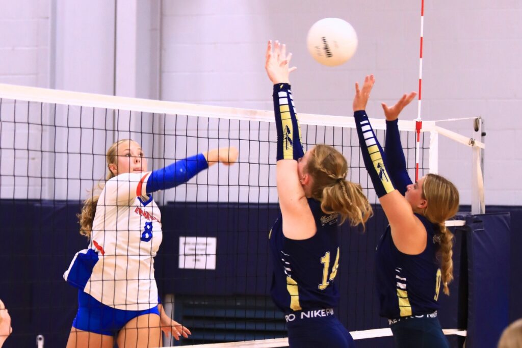 Branford's Anabella Dicks (8) with a hit against Aucilla Christian at the Crafty Gemini Preseason Showdown on Thursday. Photo by C.J. Gish