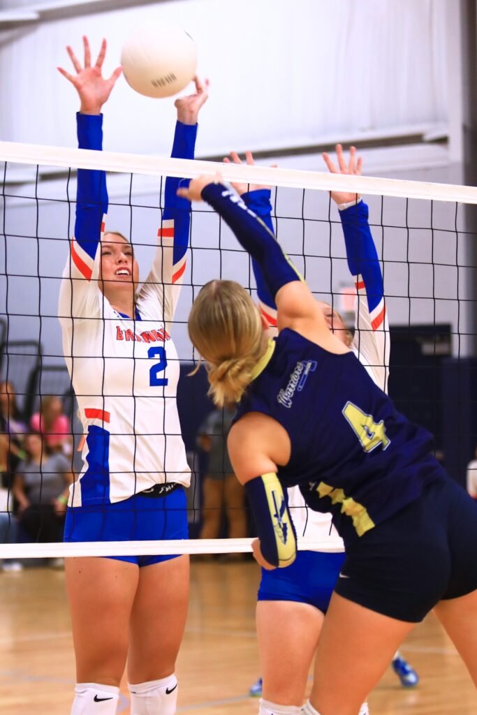 Branford's Kilee Johnson (2) with a block attempt against Aucilla Christian at the Crafty Gemini Preseason Showdown on Thursday. Photo by C.J. Gish