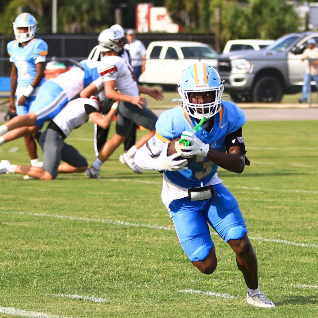 Chiefland's Brayden Hankins (3) turns upfield on a short pass play against Santa Fe Catholic (Lakeland) on Friday. Photo by C.J. Gish