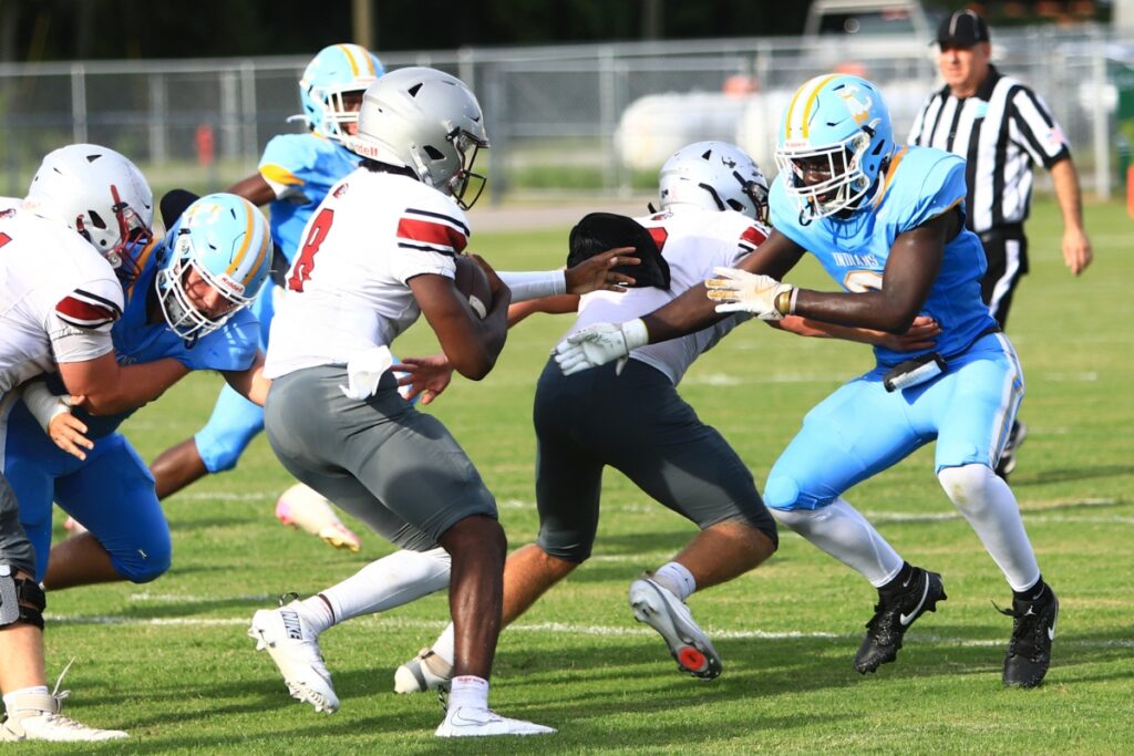 Chiefland's Jontavious Siddo (6) breaks down for a tackle against Santa Fe Catholic (Lakeland) on Friday. Photo by C.J. Gish