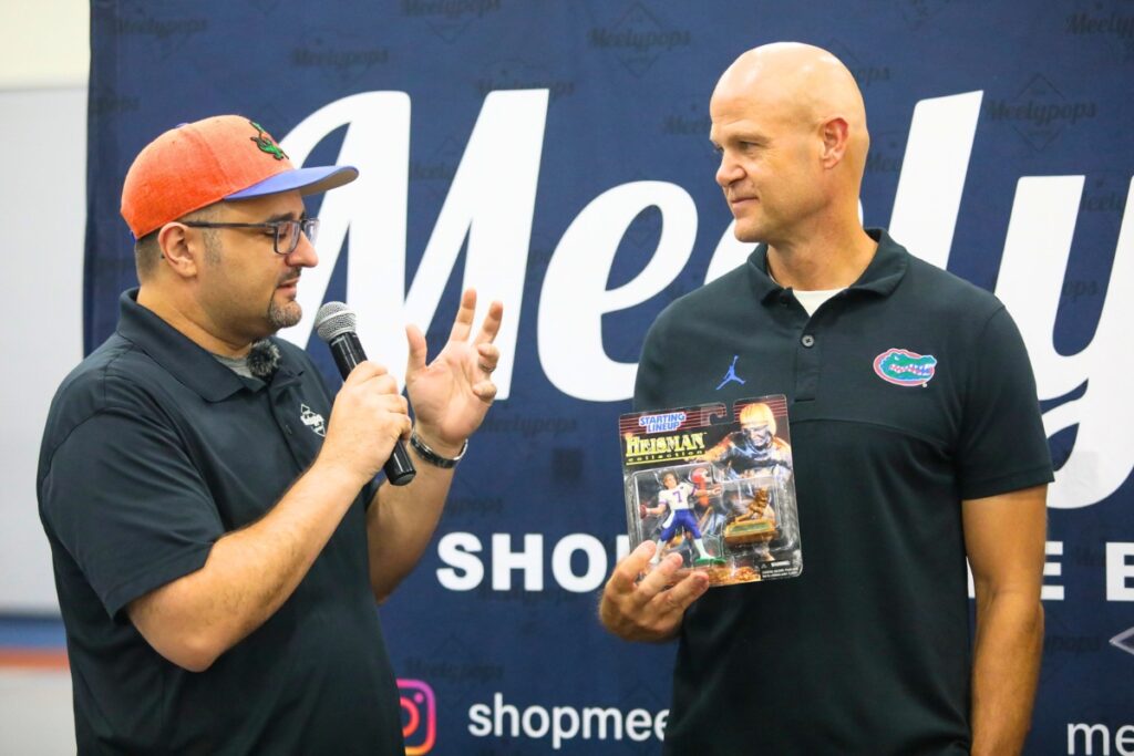 Former Florida quarterback Danny Wuerffel speaks to fans during the Florida Legends event at the Alachua County Sports & Events Center on Sunday. Photo by Walker Smith