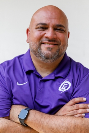 Gainesville coach Ashour Peera. Photo by Walker Smith