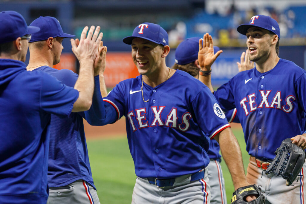 Langford celebrates with teammates following the Rangers' 4-1 victory over the Tampa Bay Rays on July 28 at Tropicana Field in St. Petersburg.