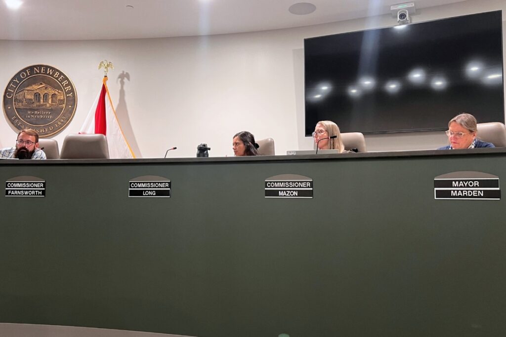 Newberry Community School Board members (from left) Derek Danne, Leslie Hayes-Morrison, Leslie McGehee and Veronica Kadala approved the 2026-27 school improvement plan at a meeting on Aug. 17.