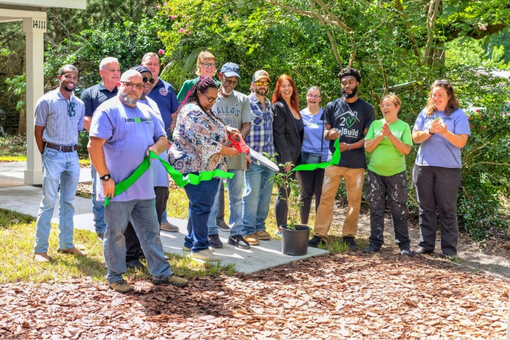 Rebuilding Together North Central Florida, Levy County commissioners, contractors, sponsors, neighbors and friends gathered to celebrate the completion of a newly constructed home for Leticia and Bobby Price on Friday in Trenton. Courtesy of RTNCF