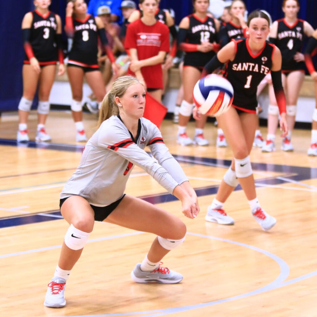 Santa Fe's Karlee Noah (9) with a dig against Buchholz at the Crafty Gemini Preseason Showdown on Thursday. Photo by C.J. Gish