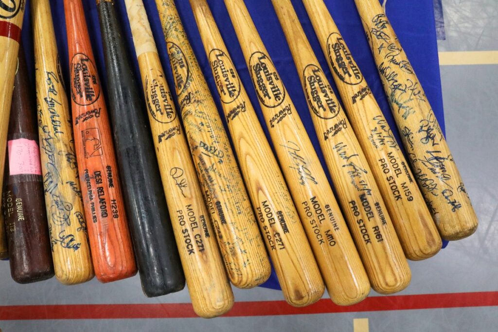 Sports memorabilia displayed on Sunday at the Florida Legends event at the Alachua County Sports & Events Center. Photo by Walker Smith