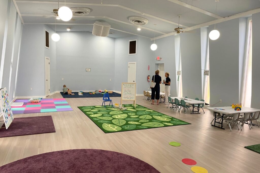 The former sanctuary space is used as a community area and for children's programing. 