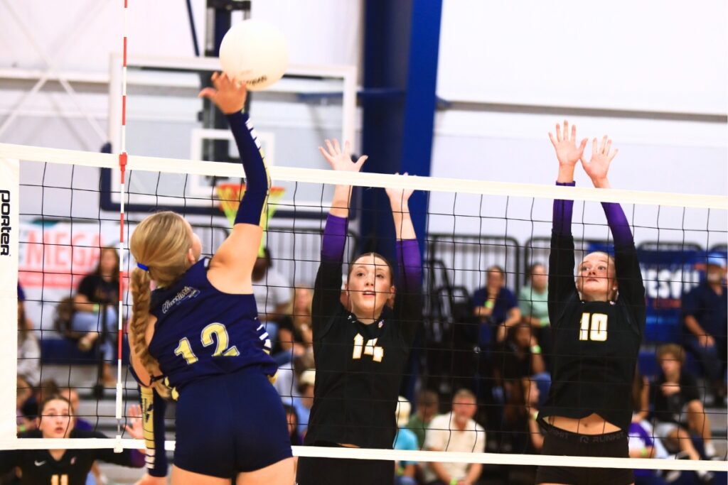 Union County's Bethany Phillips (14) and Mallory Waugh (10) go for a block against Aucilla Christian at the Crafty Gemini Preseason Showdown on Thursday. Photo by C.J. Gish