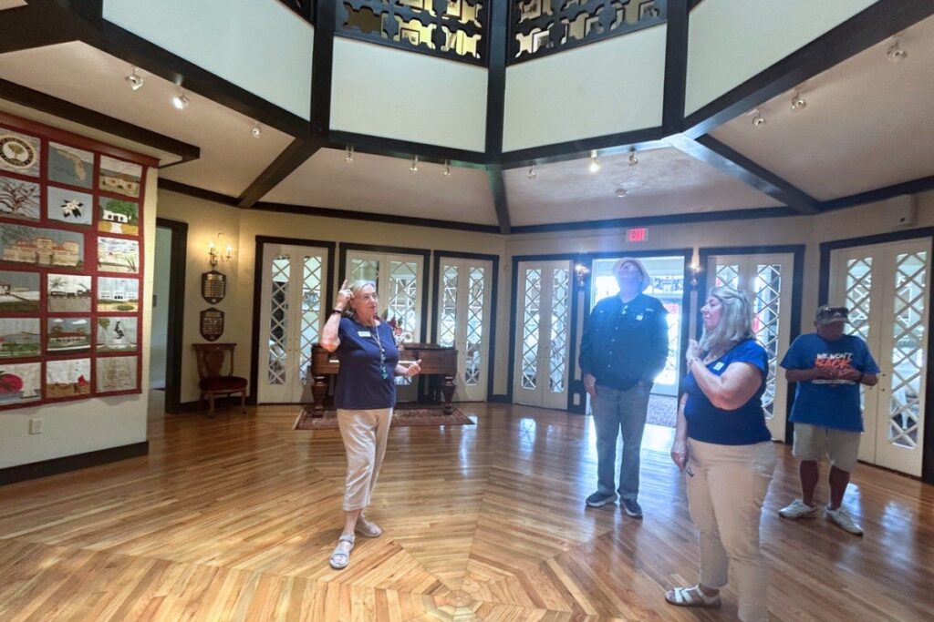 Barbara Schulman gives a tour of The Casements to a group. Photo by Ronnie Lovler