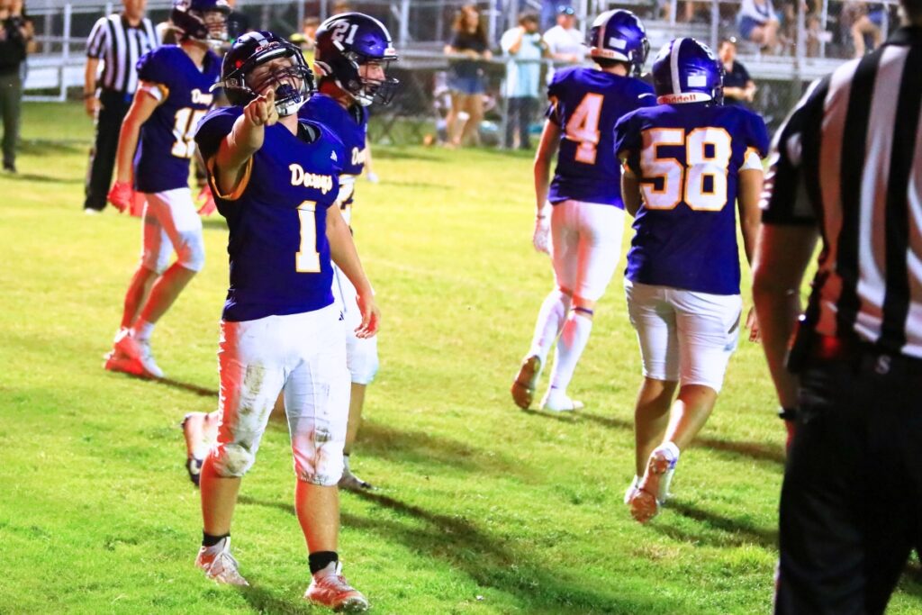 Bell's RJ Leffler celebrates after scoring a late fourth-quarter touchdown against Keystone Heights. Photo by C.J. Gish