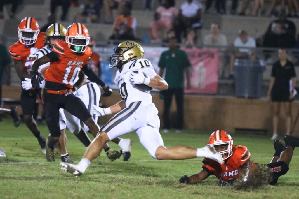 Buchholz's Koy Frier (10) looks for an opening against Eastside's defense on Friday. Photo by Walker Smtih