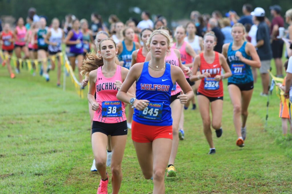 Buchholz's Morgan Outcalt sticks behind Elli Kane at the Bobcat Classic, finishing 9th and 8th respectively. Photo by Seth Johnson