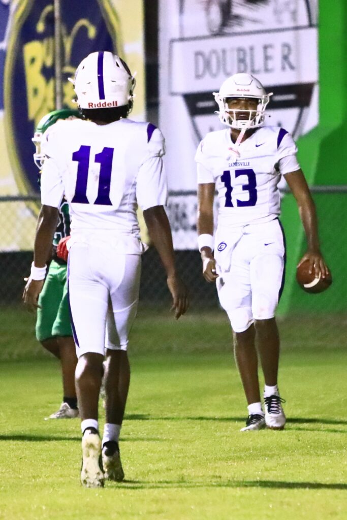 Gainesville's Sy Jones (13) catches a 2-point conversion in the second quarter at Suwannee (Live Oak) on Friday. Photo by C.J. Gish