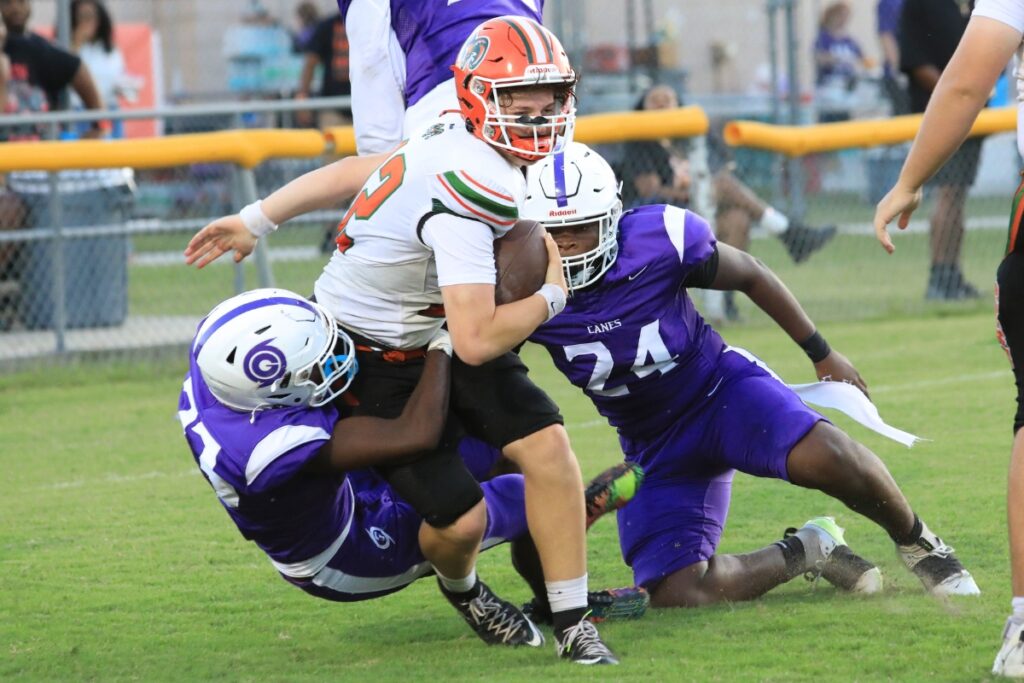 Gainesville's defense brings down the Eastside quarterback Andrew Sutherland in his own end zone, but not before he earned forward progress at the one-yard line.