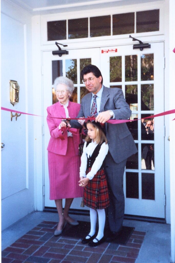 Grand opening ribbon cutting with Sarah Matheson, Gainesville Mayor William Painter and his daughter on March 12, 1994. Courtesy of Matheson History Museum