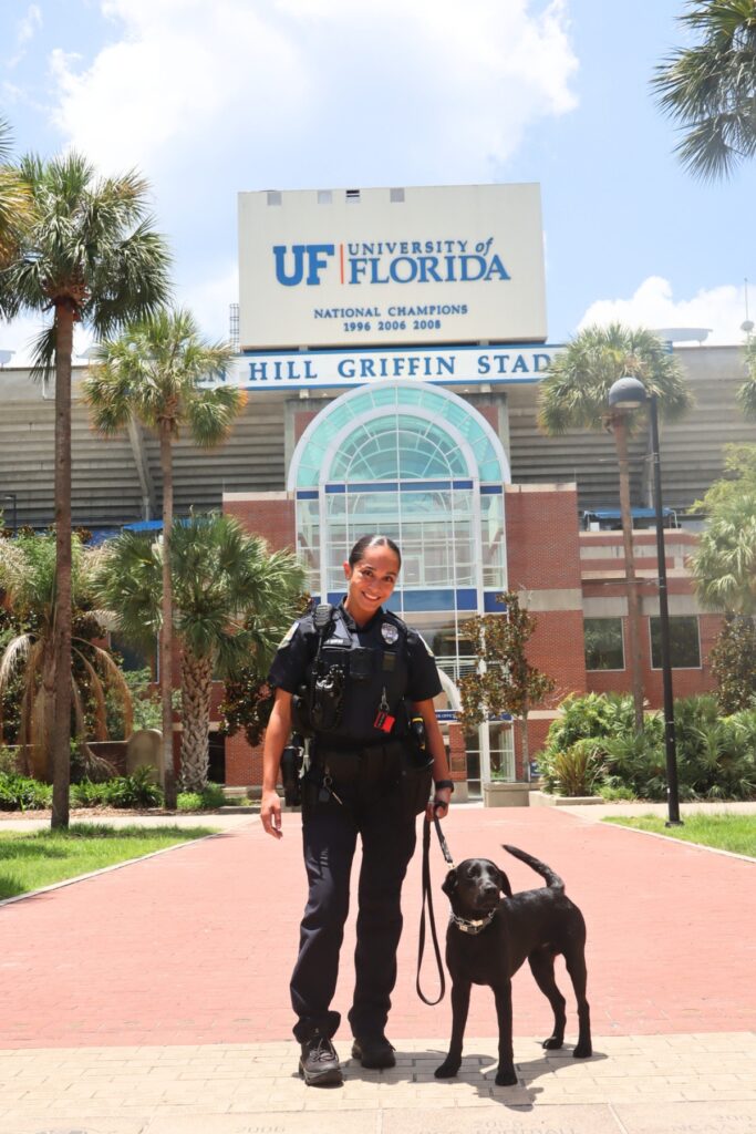 K-9 Maverick, with UFPD Officer Jenna Cuevo, spent months training for bomb detection at large-scale events on campus. Courtesy UFPD