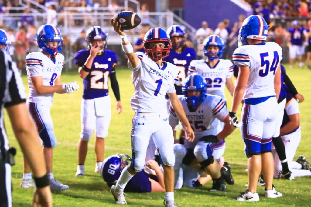 Keystone Heights' Cole Crabtree scored on a quarterback sneak in the first quarter against Bell. Photo by C.J. Gish