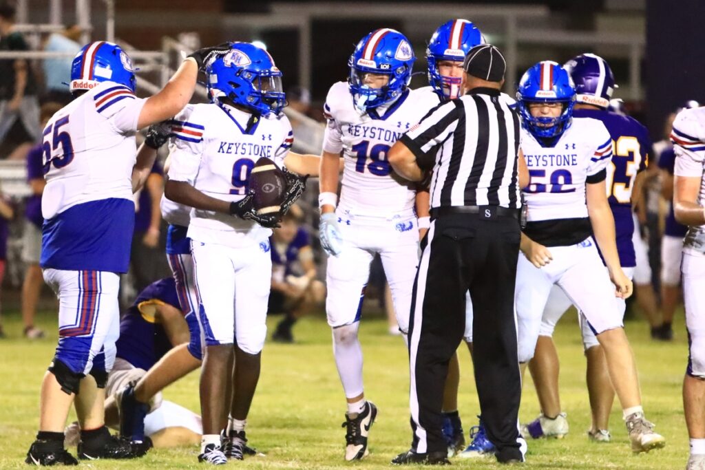 Keystone Heights' DJ Hill with a fourth-quarter interception against Bell. Photo by C.J. Gish
