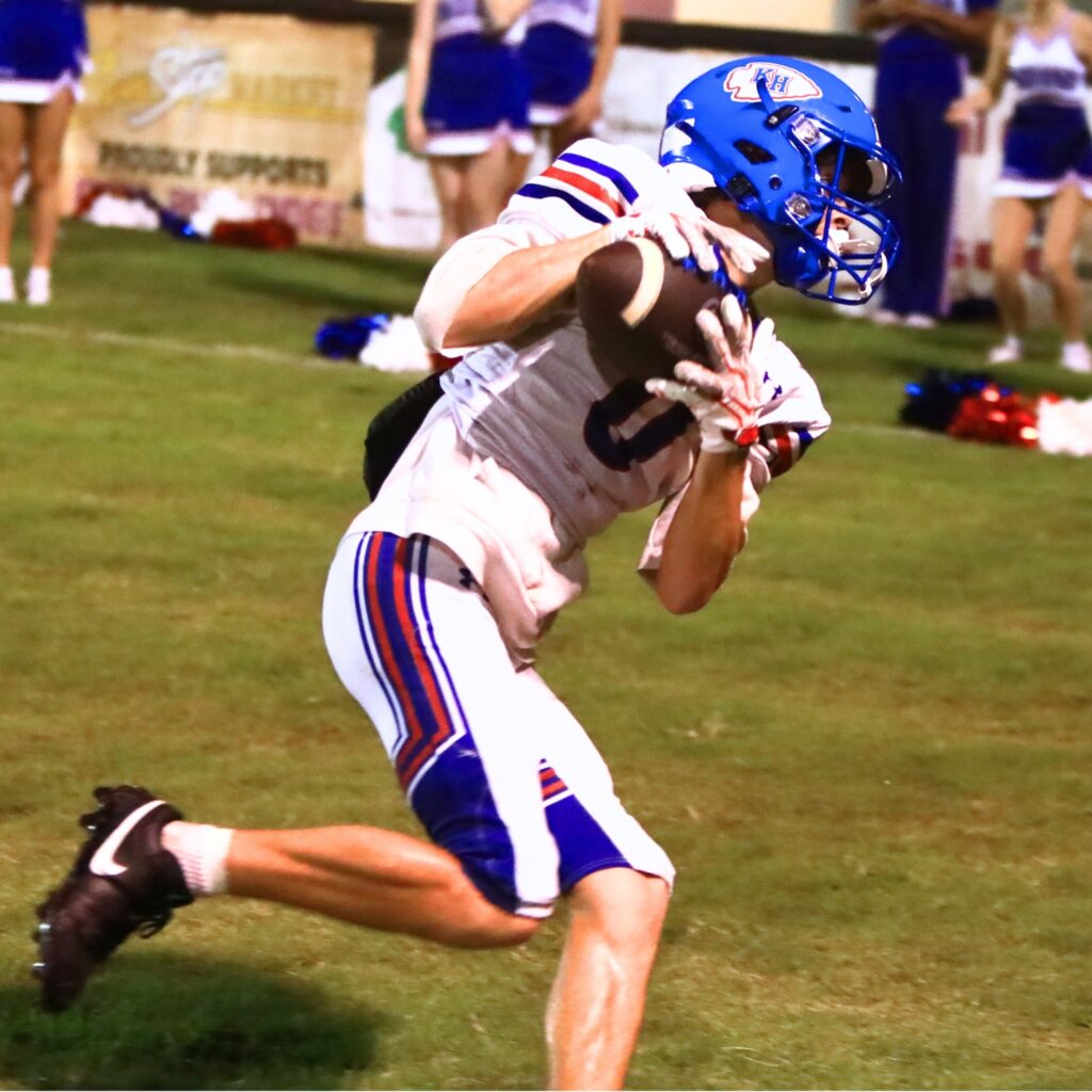 Keystone Heights' Trey Simmons (0) hauls in a fourth-quarter touchdown against Bell. Photo by C.J. Gish