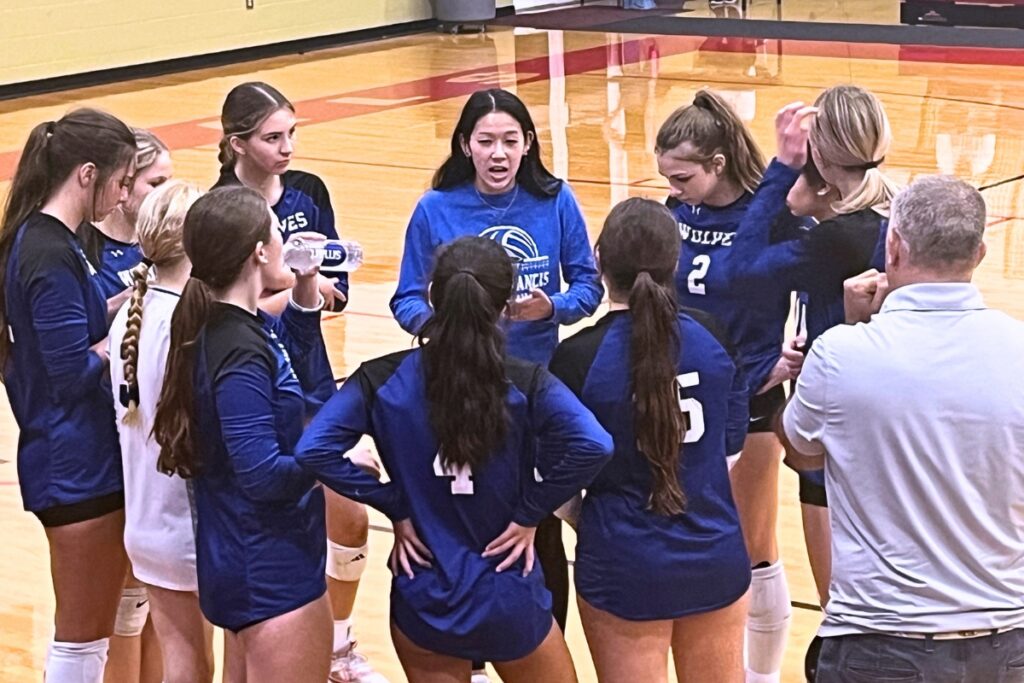 Saint Francis Catholic Academy head coach Breona Fung talks to her team during its match at Bishop Snyder (Jacksonville) on Tuesday. Photo by Mike Ridaught