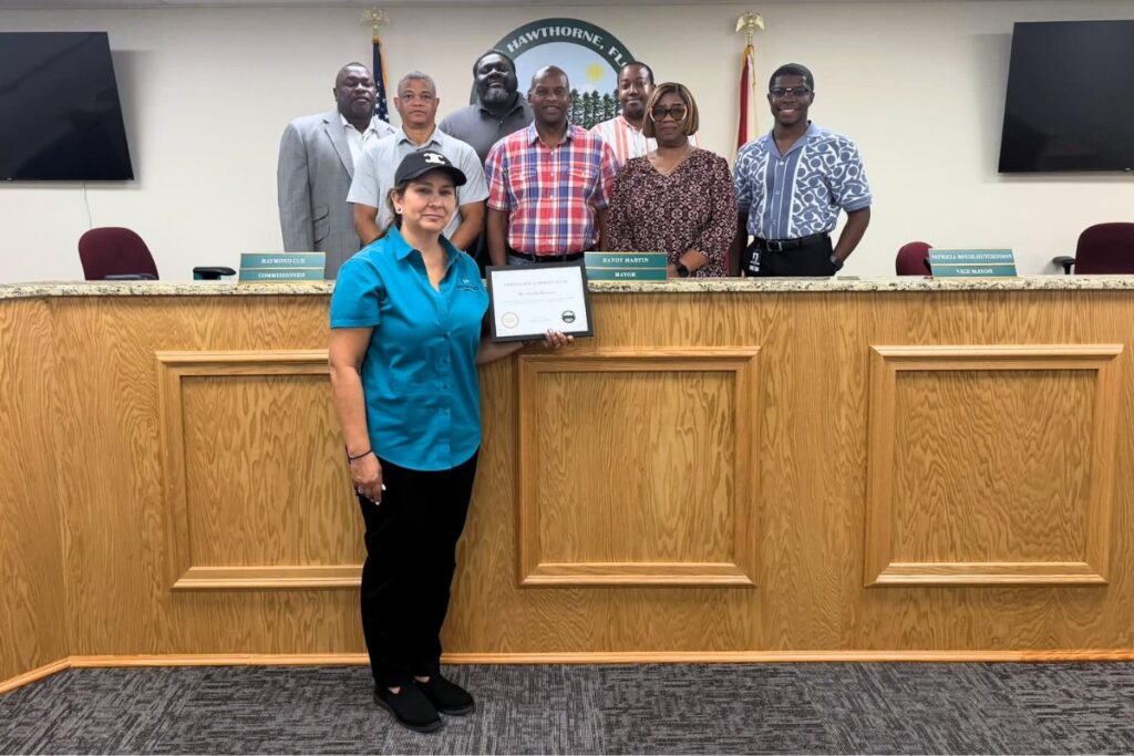 The Hawthorne City Commission honored Hitchcock's Market employees for donating store closing food to the area resource center. Courtesy city of Hawthorne