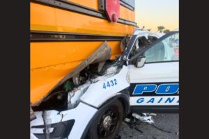Gainesville police officer seriously injured in collision with Marion County school bus